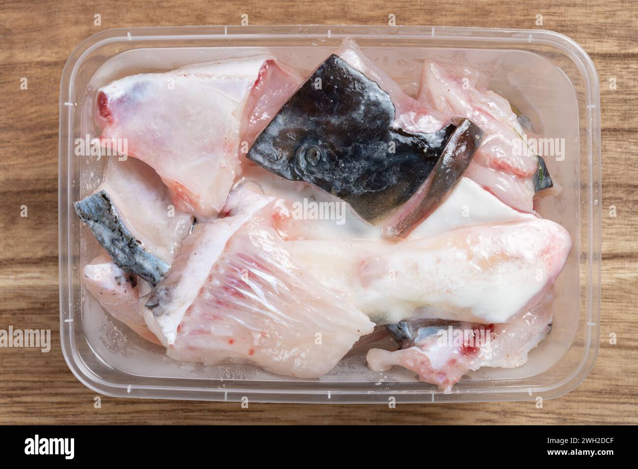 top view box of sliced fish Stock Photo - Alamy