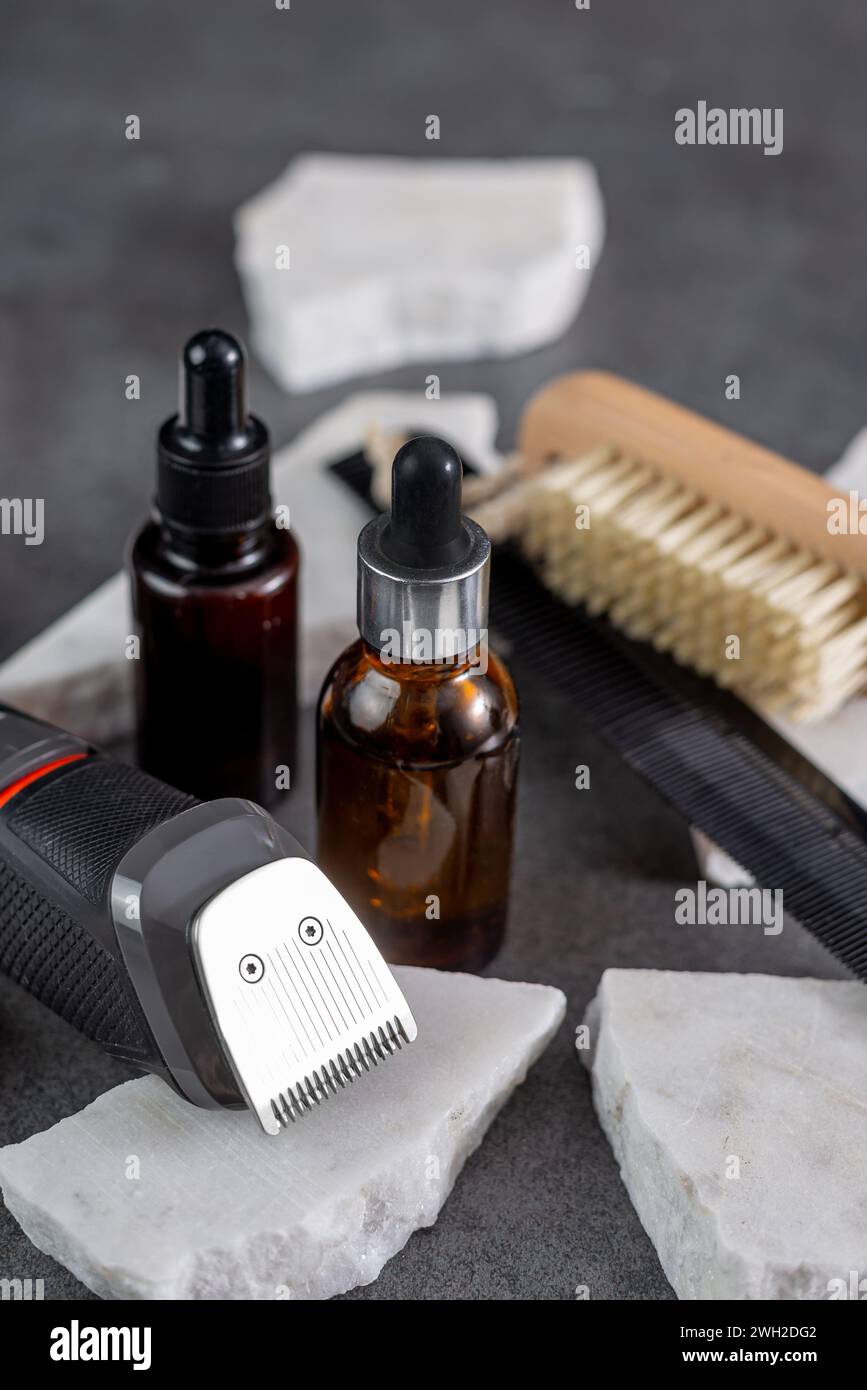 beard care kit. Clipper, comb, beard oil Stock Photo