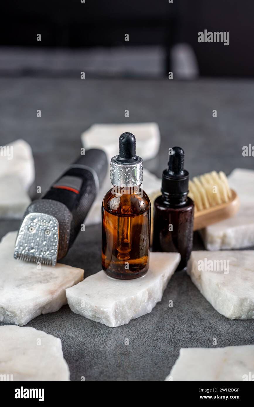 beard care kit. Clipper, comb, beard oil Stock Photo