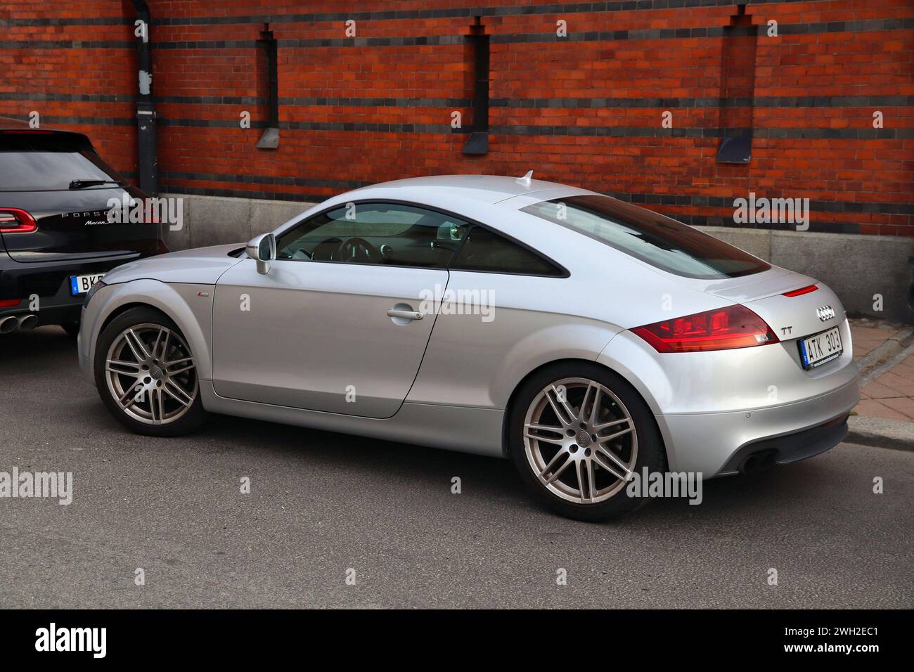 STOCKHOLM, SWEDEN - AUGUST 24, 2018: Silver Audi TT sports coupe car parked in Stockholm, Sweden. There are 4.8 million passenger cars registered in S Stock Photo