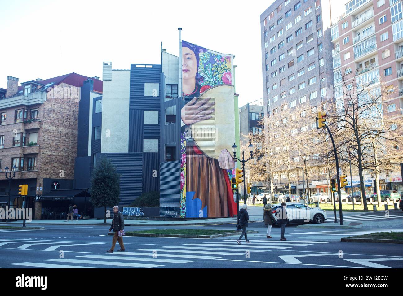 Gijón, Asturias, Spain. Mural, Asturiana, author Jonatan Carranza 'Sojo'. Traditional Asturian music theme, is on Avenida de la Costa Stock Photo