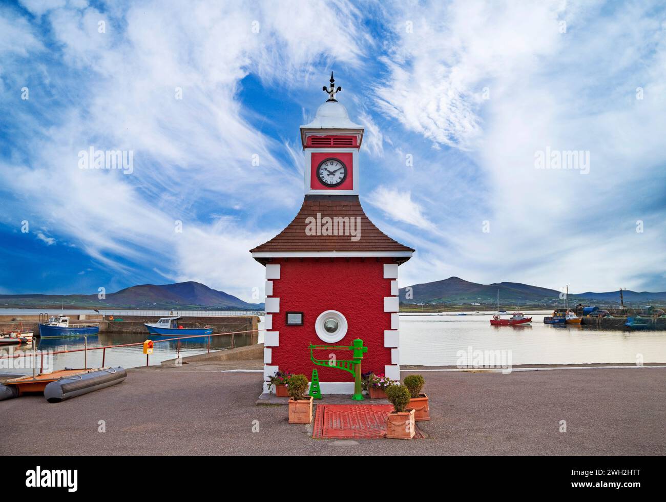 A clock-tower folly overlooking Knightstown harbour on Valentia Island, in County Kerry, Ireland. Stock Photo