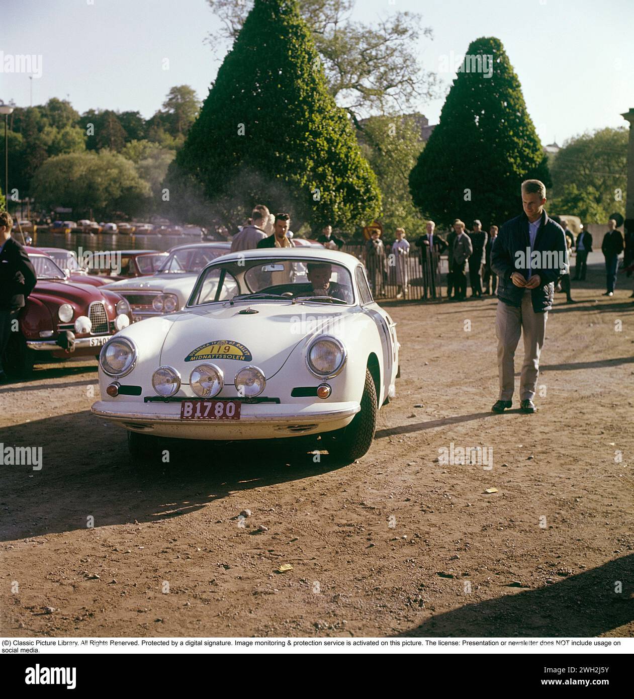 Midnight Sun Rally 1963. A car race that was first run in 1950 and last time in 1964. The rally was founded in 1950 by car director Ernst S. Nilson. Here, Berndt Jansson at the start at Karlberg Castle on June 18, 1963. He drives a Porsche 356 Carrera 2 GT and also wins this year's edition of the rally. Conard ref CV35, 36, 37 Stock Photo