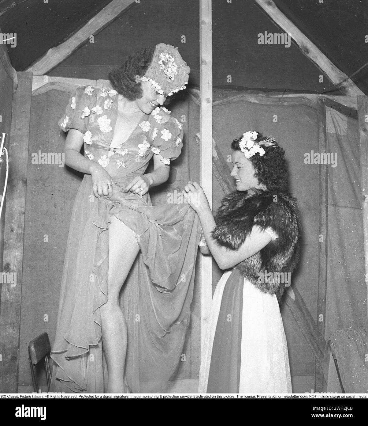 Backstage at the theater in the 1940s. A young woman in the theater ...
