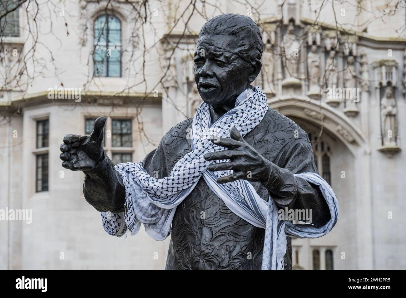 London, UK. 7th Feb, 2024. The statue of Nelson Mandela is a focal point because of his support for a free palestine - Palestine protest, calling for a Ceasefire Now and for the west to Stop arming Israel, organised by Parents for Palestine to the ongoing outbreak of violence and the Israeli response in Gaza. Credit: Guy Bell/Alamy Live News Stock Photo