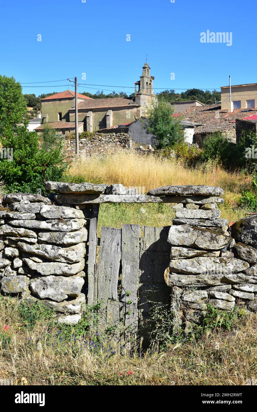 Fornillos de Fermoselle, Villar del Buey municipality. Door and church. Zamora province, Castilla y Leon, Spain. Stock Photo