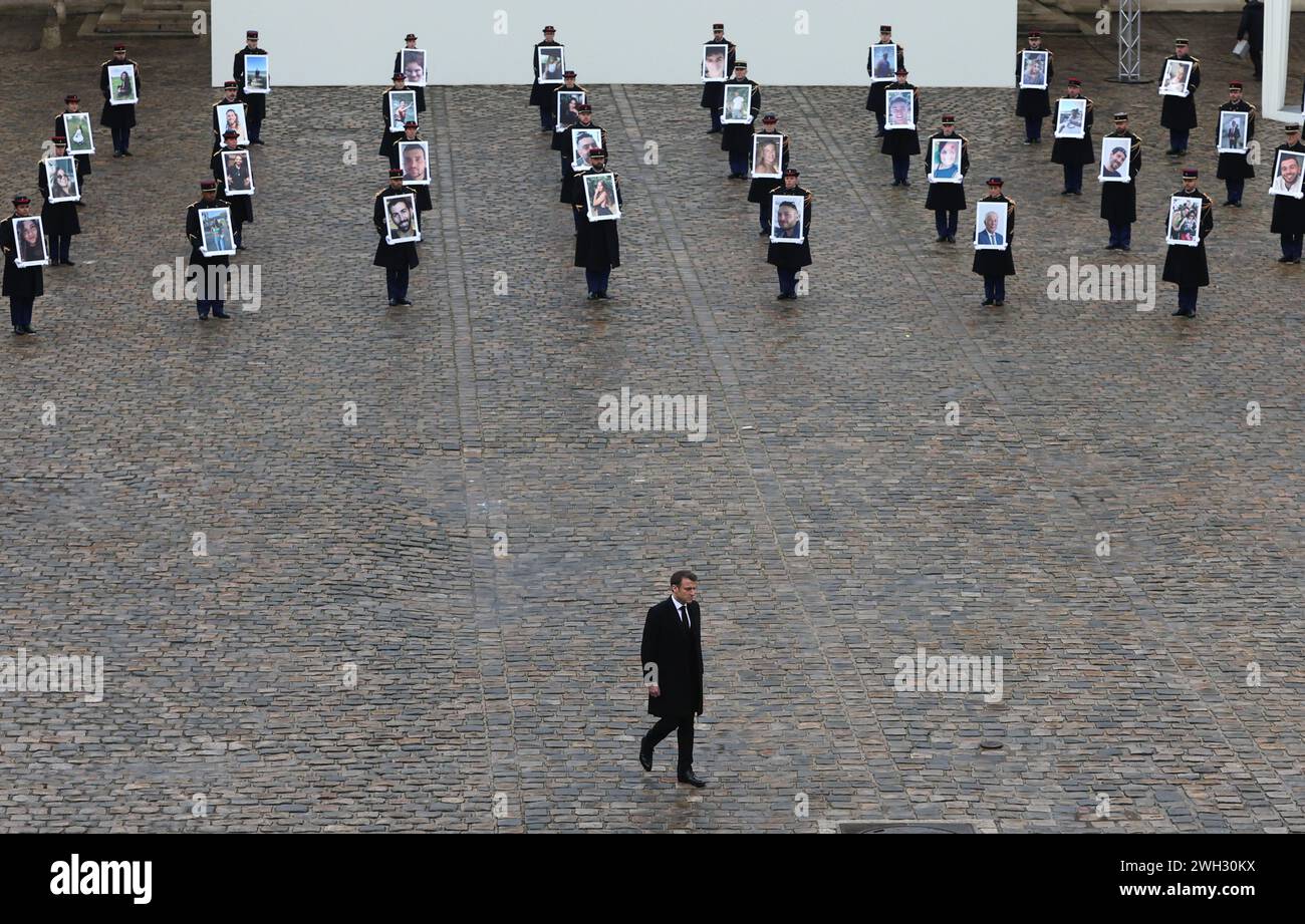 Paris, France. 07th Feb, 2024. French President Emmanuel Macron heads a ceremony in tribute to the French victims of the Hamas' Oct 7th attack in southern Israel at the Invalides in Paris, on Wednesday, February 7, 2024, four months to the day after armed gunmen from Gaza executed 1,200 people and kidnapped 253 hostages. Republican guards held the portrait-pictures of the 42 French victims of the massacre. Photo by Maya Vidon-White/UPI . Credit: UPI/Alamy Live News Stock Photo