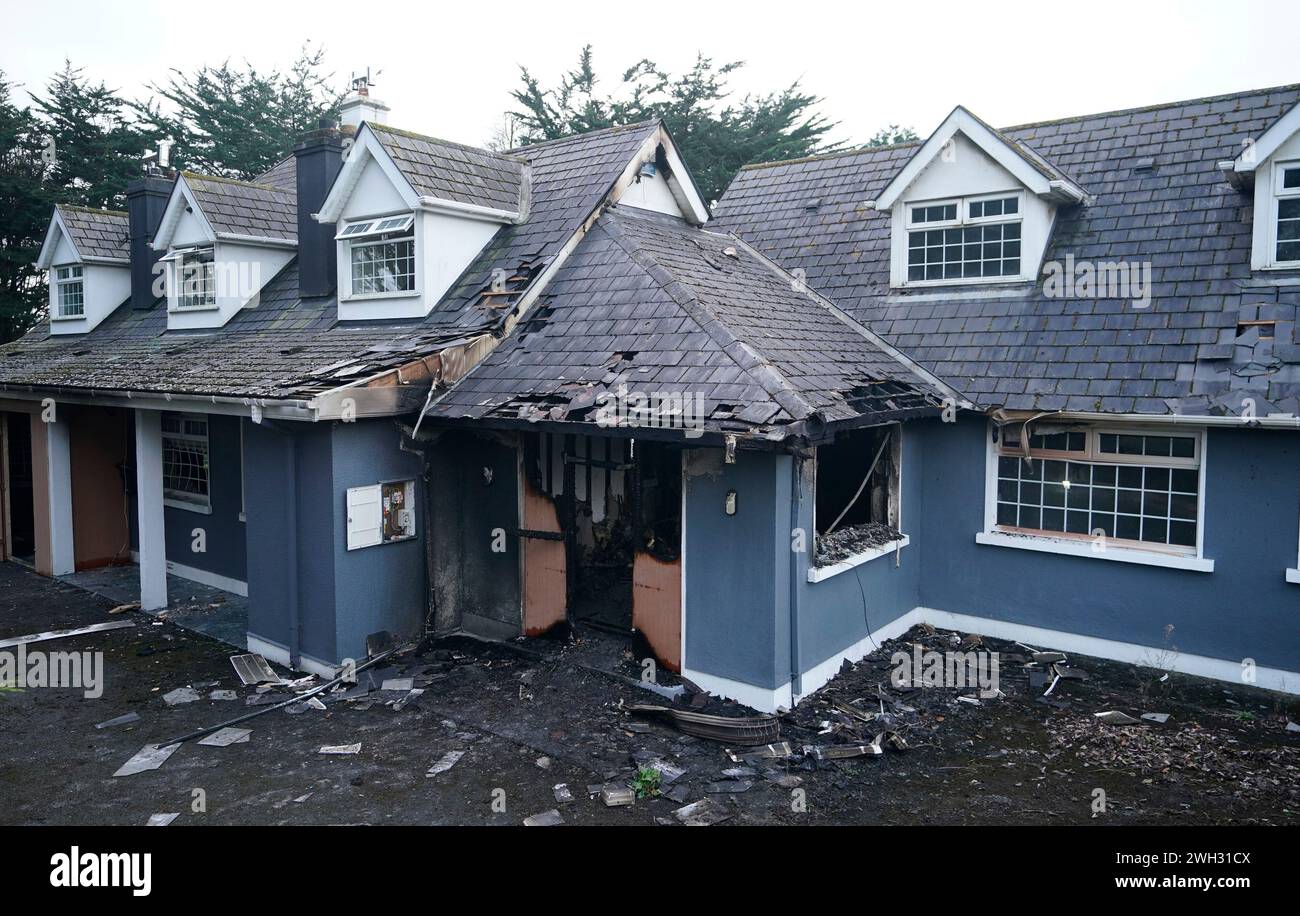 The scene of a suspected arson attack at a vacant house in Co Kildare, which was wrongly rumoured to be planned accommodation for asylum seekers. The building, according to gardai, was the subject of a 'significant volume' of misinformation, disinformation and rumour in relation to its use or intended purpose. The seven-bedroom detached house in Leixlip was linked to housing for asylum seekers. Picture date: Wednesday February 7, 2024. Stock Photo