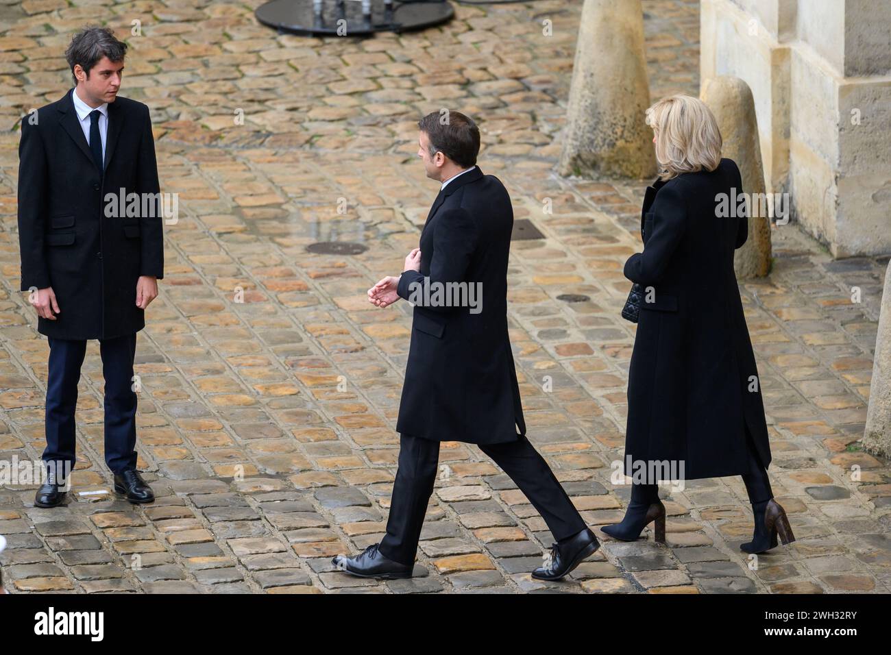 Julien Mattia/Le Pictorium - National Tribute to the Victims of the Hamas Attacks in Israel - 07/02/2024 - France/Ile-de-France (region)/Paris - Arrival of President of the Republic, Emmanuel Macron welcomed by the Ministers, Le Ministre de l'Interieur et des Outre-mer, Gerald Darmanin, Le Premiere Ministre, Gabriel Attal, Le Ministre de la Justice, et garde des Sceaux, Eric dupond-Moretti and Le Ministre des Affaires Etrangeres Stephane Sejourne at the ceremony to honor the French victims of the October 7 terrorist attacks in Israel, at Les Invalides, February 7, 2024. Stock Photo