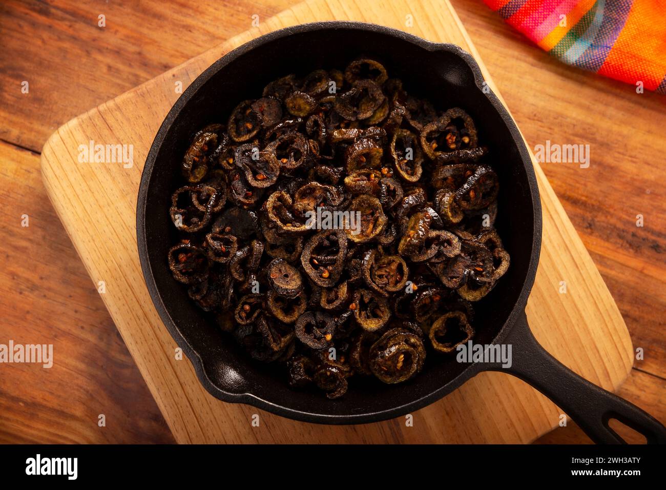 Chili chips in cast iron skillet. In Mexico called Chicharron de Chile