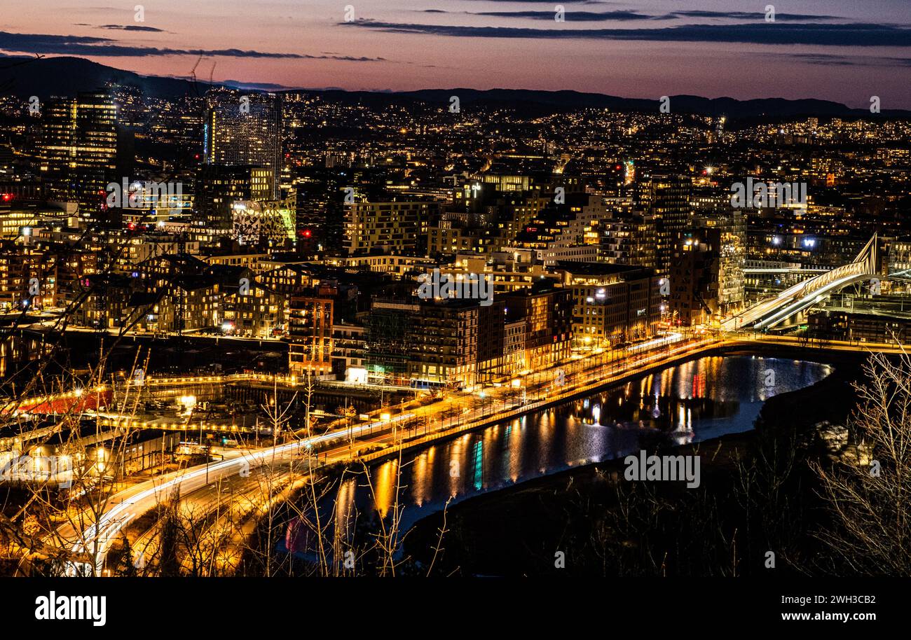 The citylights of Oslo, Norway from the Ekesberg sculpture park viewpoint. Stock Photo