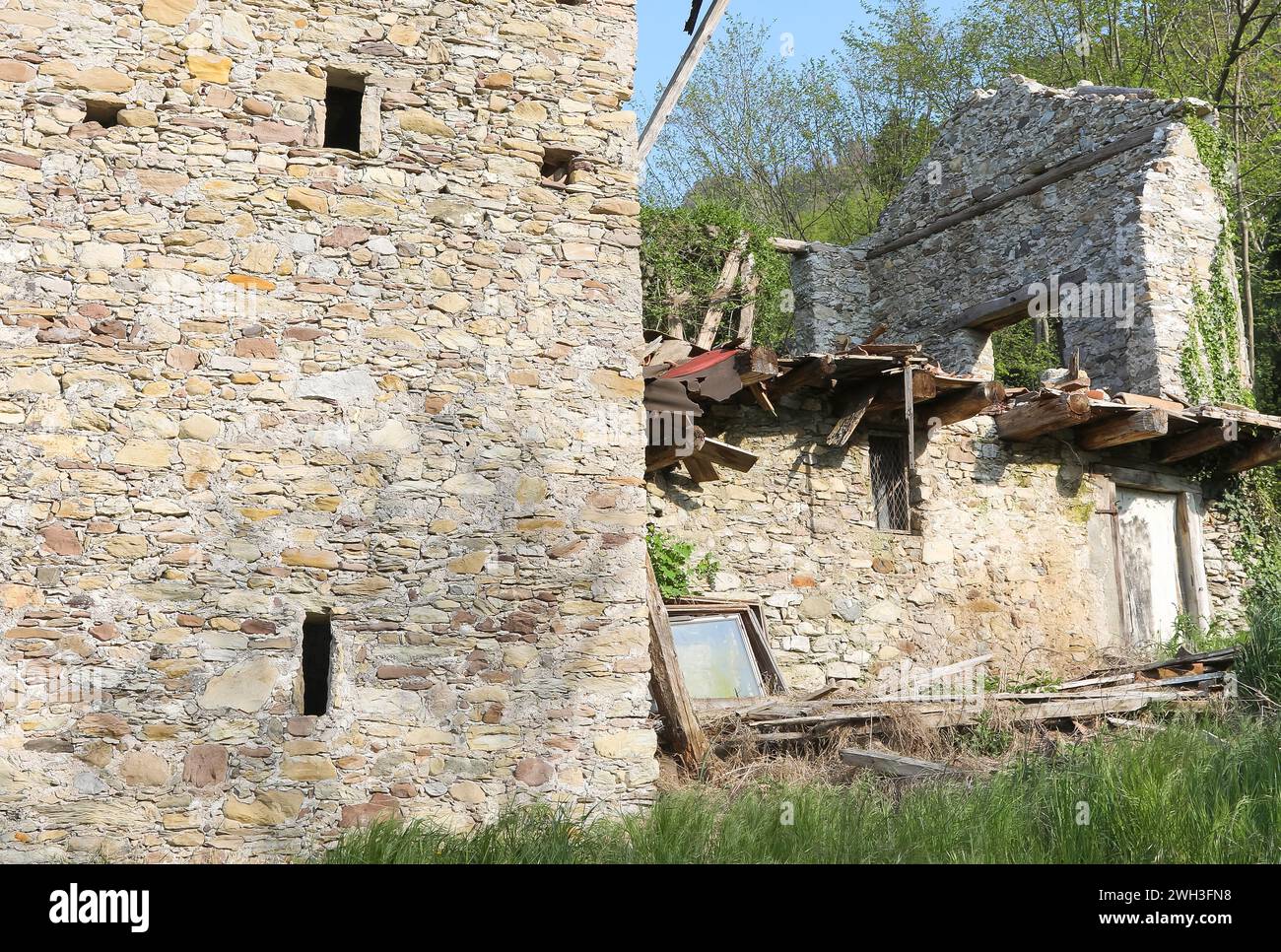 ruins and broken walls of the old house destroyed by the earthquake ...