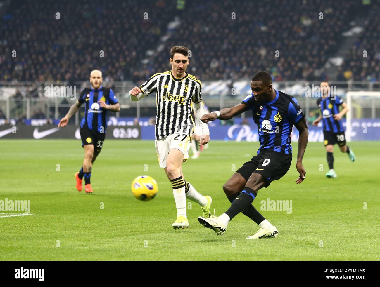 Marcus thuram of inter milan r and andrea cambiaso of juventus l