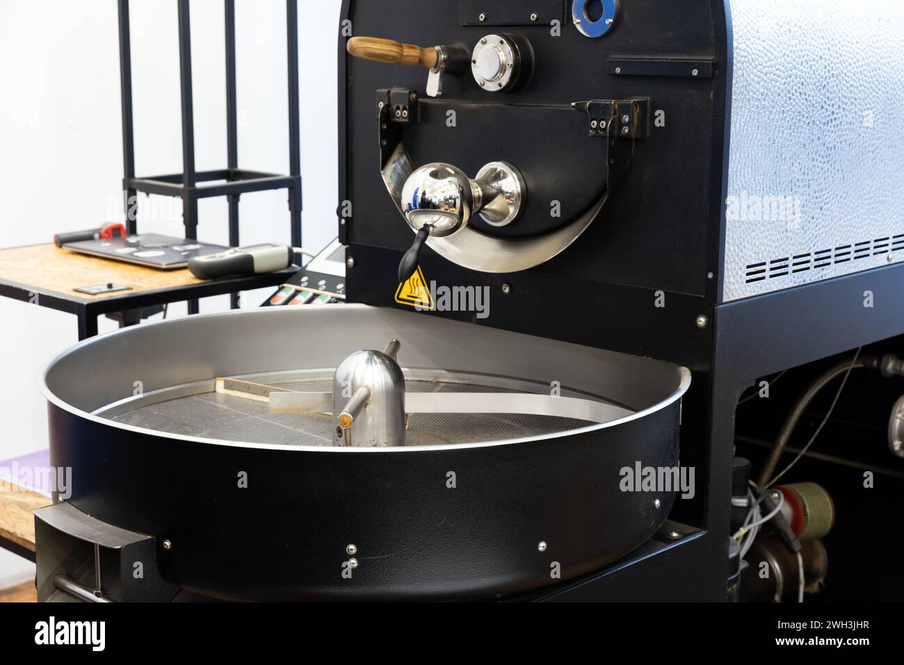 Coffee roaster close up photo, empty cooling drum Stock Photo