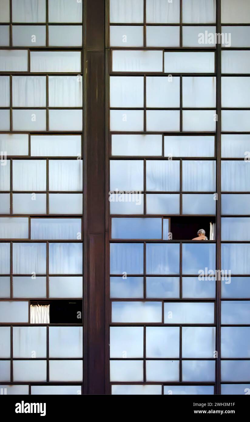 woman in a window Stock Photo