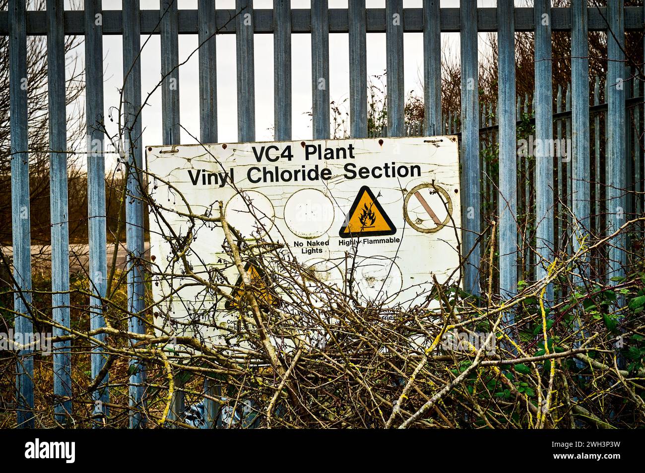 Old sign in front of now closed  chemical production plant Stock Photo