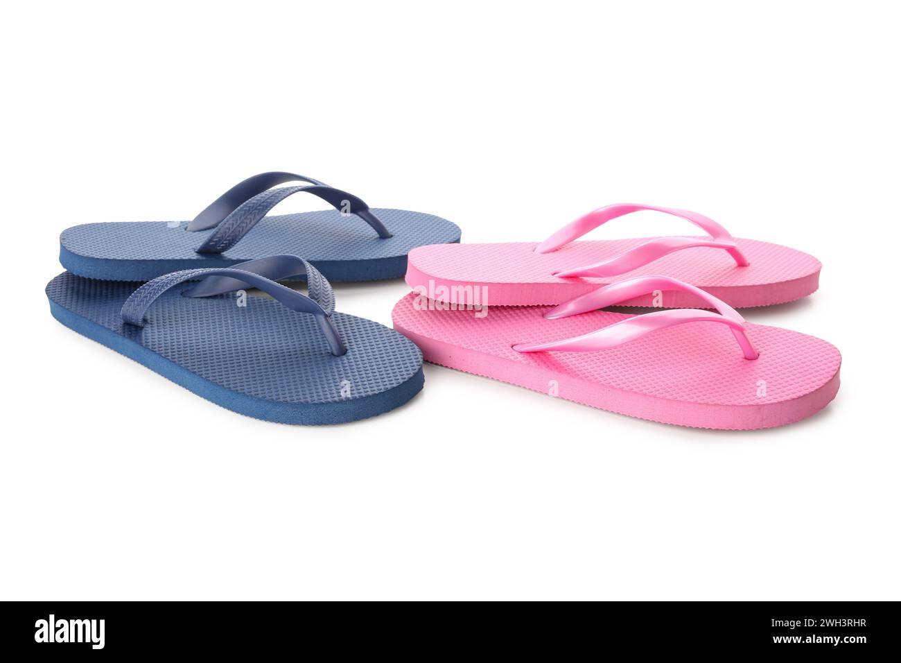 Colorful pairs of female flip flops on white background Stock Photo - Alamy