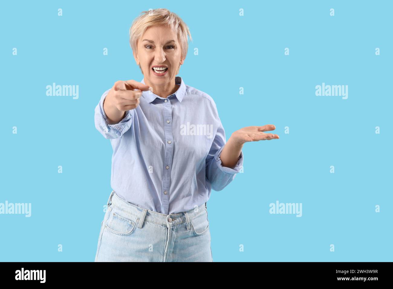 Angry mature woman pointing hi-res stock photography and images - Alamy