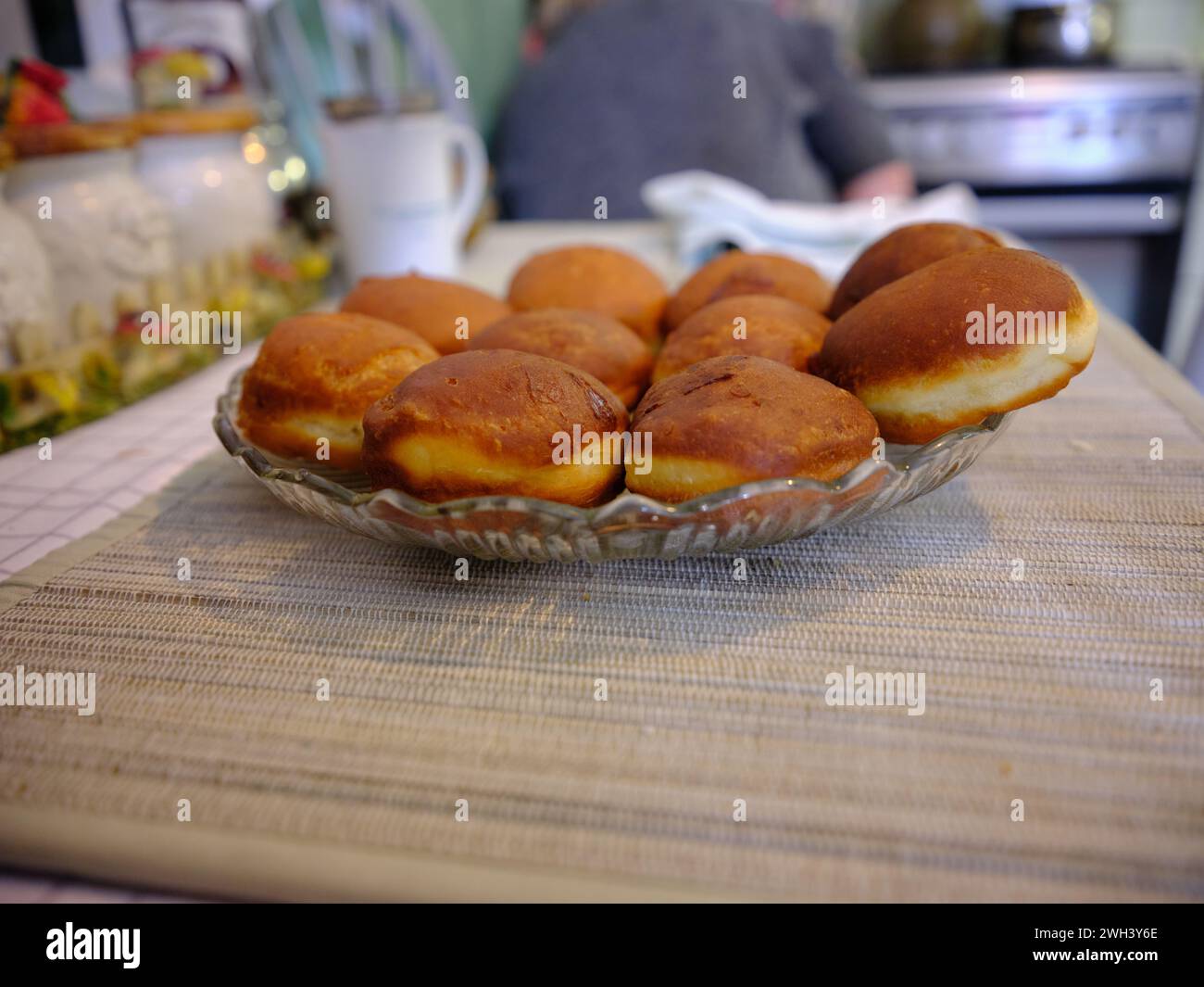 Homemade donuts with rose's stuffing. On the Polish table, in Polish