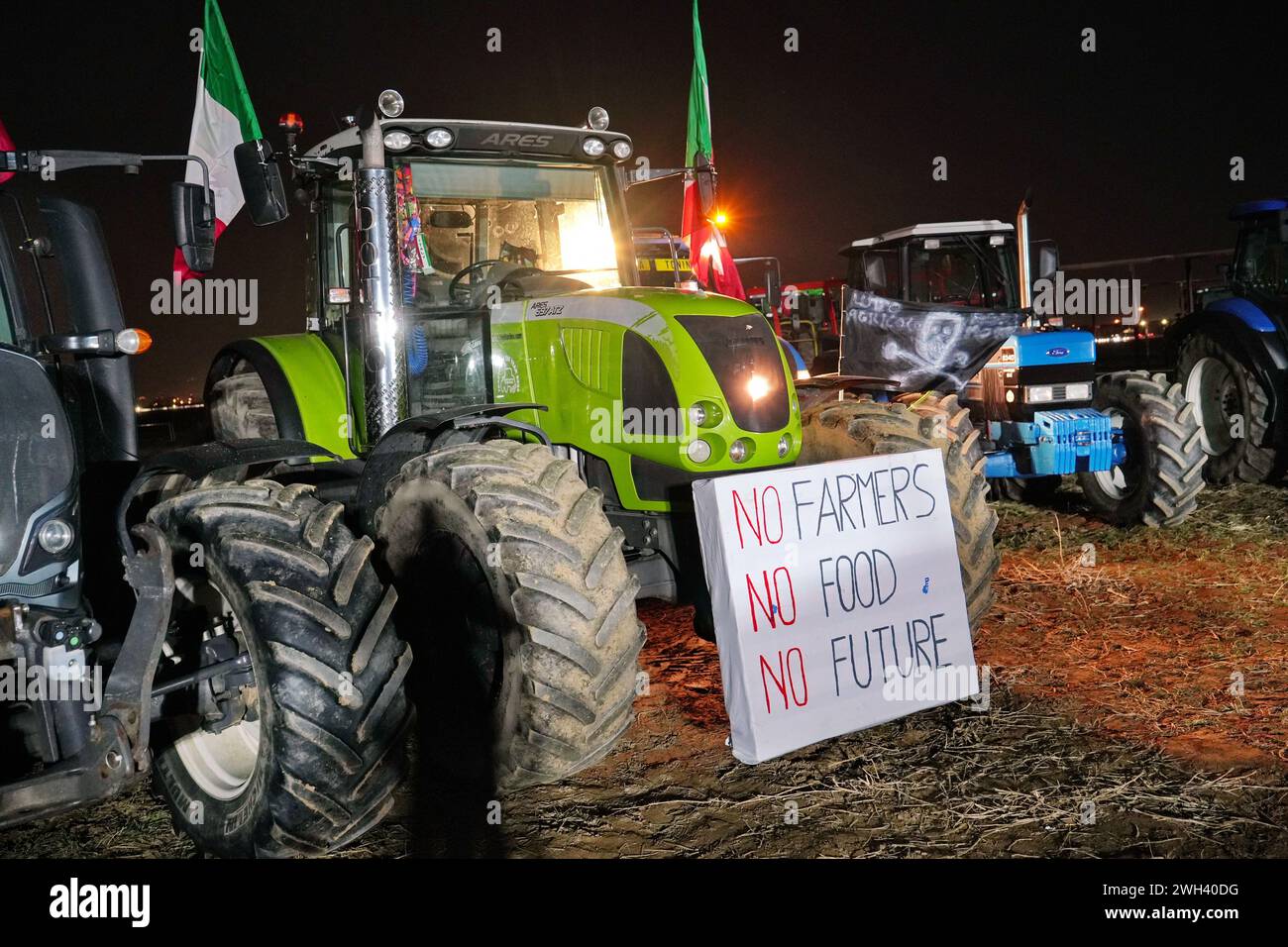 Rivoli, Italy - February 7, 2024: Farmers Protest With Tractors against European policies on production costs. Stock Photo