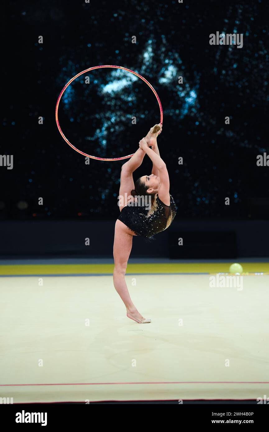 gymnast girl perform at rhythmic gymnastics competition Stock Photo