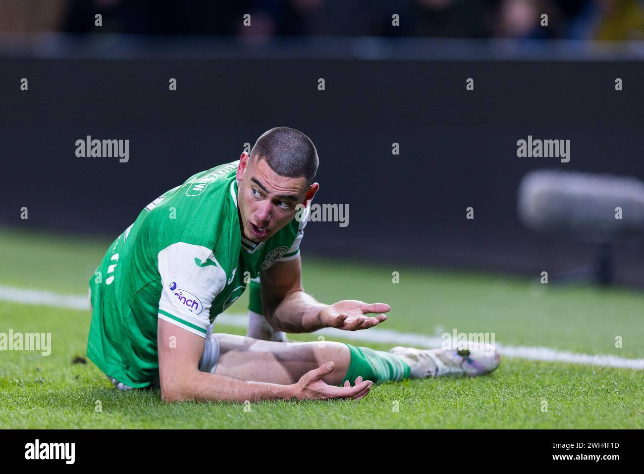 Edinburgh, Scotland. 07 February 2024.  Owen Bevan  (3 - Hibernian) is surprised not to be given a foul after receiving a blow to the face  Credit: Raymond Davies / Alamy Live News Stock Photo