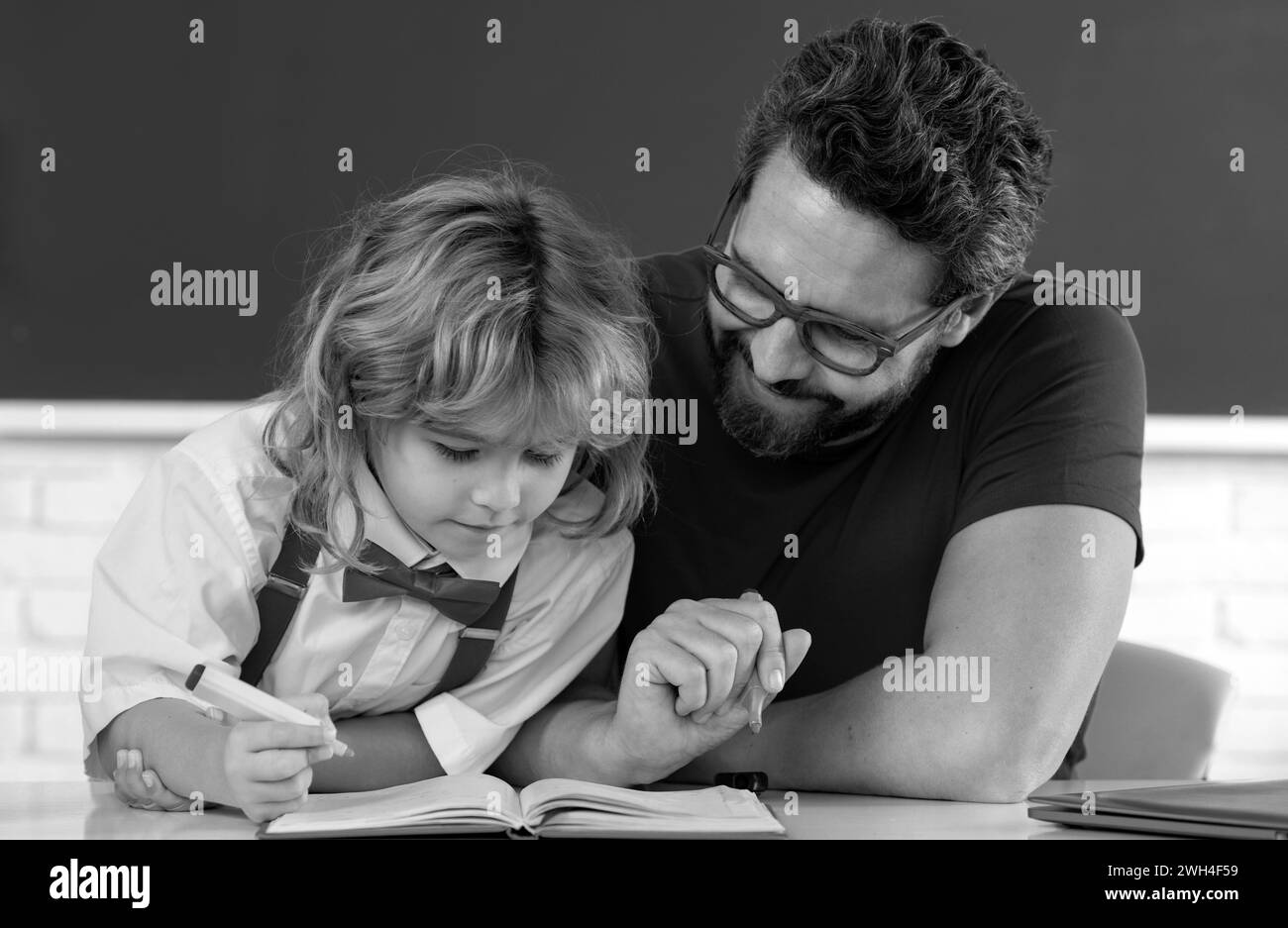 Concerned teacher with student Black and White Stock Photos & Images ...