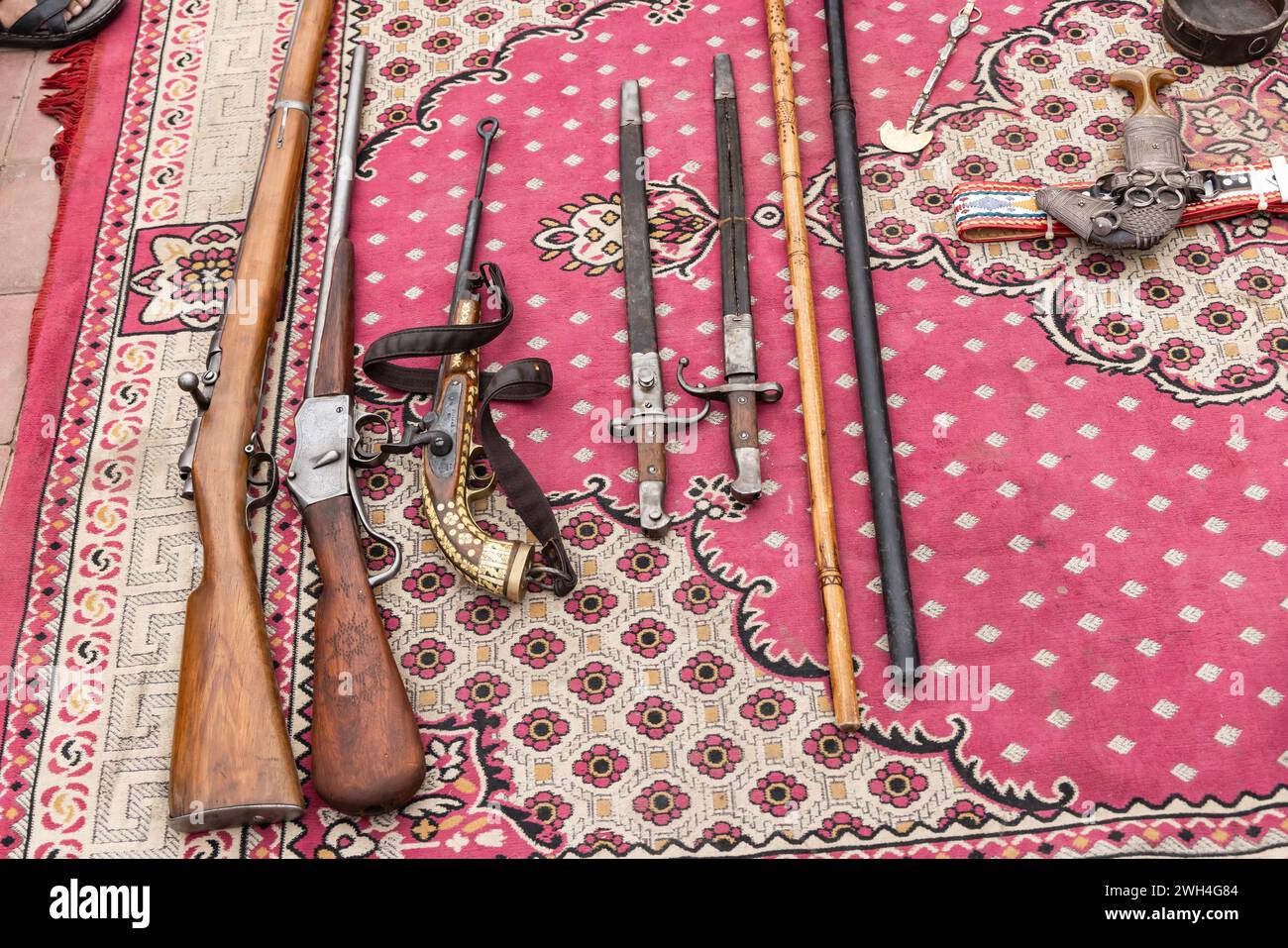 Middle East, Saudi Arabia, Riyadh, Al-Dirah.  Rifles, swords, and walking sticks at the Souq Al-Zal. Stock Photo