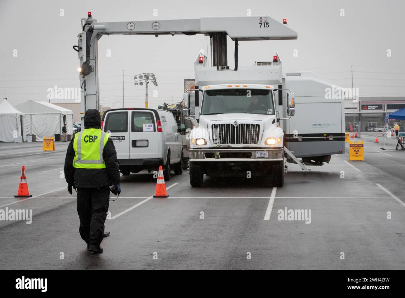 U.S. Customs and Border Protection officers with the Office of Field Operations conduct Non-Intrusive Inspections of vehicles as they enter a secure area near Allegiant Stadium in advance of Super Bowl LVIII in Las Vegas, Nev., Feb. 6, 2024. CBP Photo by Jerry Glaser Stock Photo