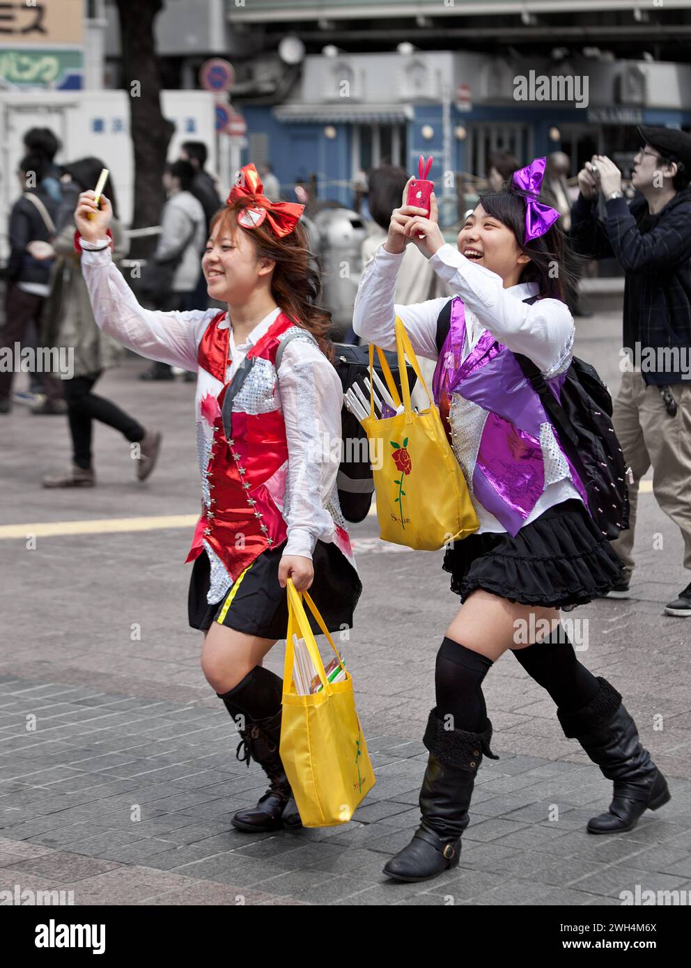 Japanese Girls outside Shibuya Train Station in Tokyo, Japan. Stock Photo