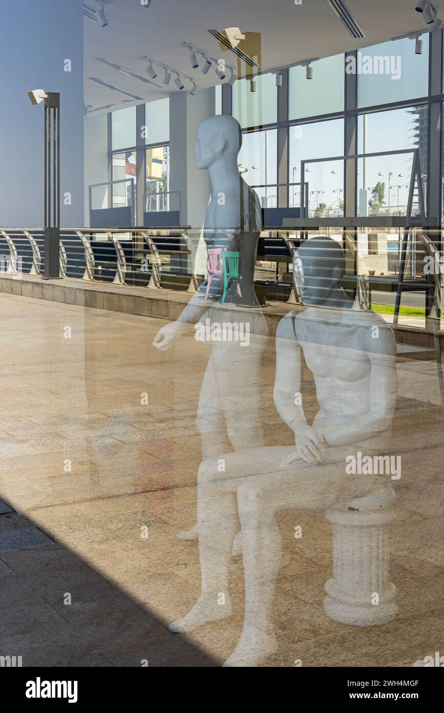 Middle East, Saudi Arabia, Mecca Province, Jeddah. Mannequins behind relections in Jeddah. Stock Photo
