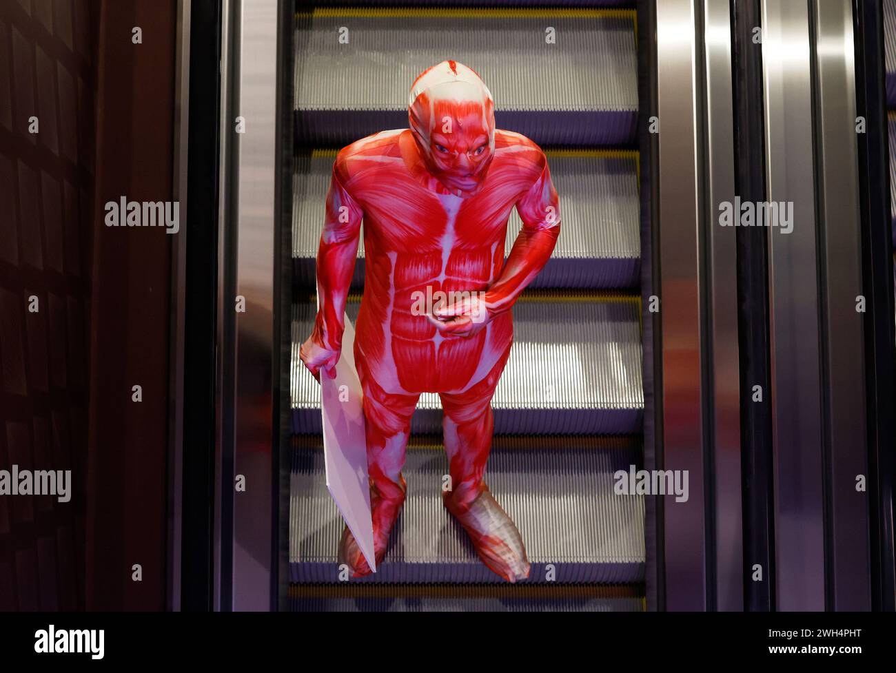 Las Vegas, United States. 07th Feb, 2024. A worker dressed in costume to advertise for 'Bodies The Exhibition' rides an elevator at the Luxor Hotel & Casino leading up to Super Bowl LVIII at the Mandalay Bay Convention Center in Las Vegas, Nevada on Wednesday, February 7, 2024. The San Francisco 49ers will play the Kansas City Chiefs in Super Bowl LVIII at Allegiant Stadium in Las Vegas, Nevada on Sunday, February 11, 2024. Photo by John Angelillo/UPI Credit: UPI/Alamy Live News Stock Photo