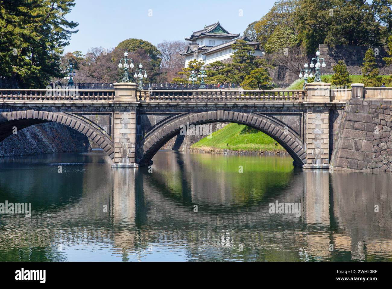 The Nijubashi bridge and Fujimi Yagura turret at the Japanese Imperial Palace in Tokyo, Japan. Stock Photo