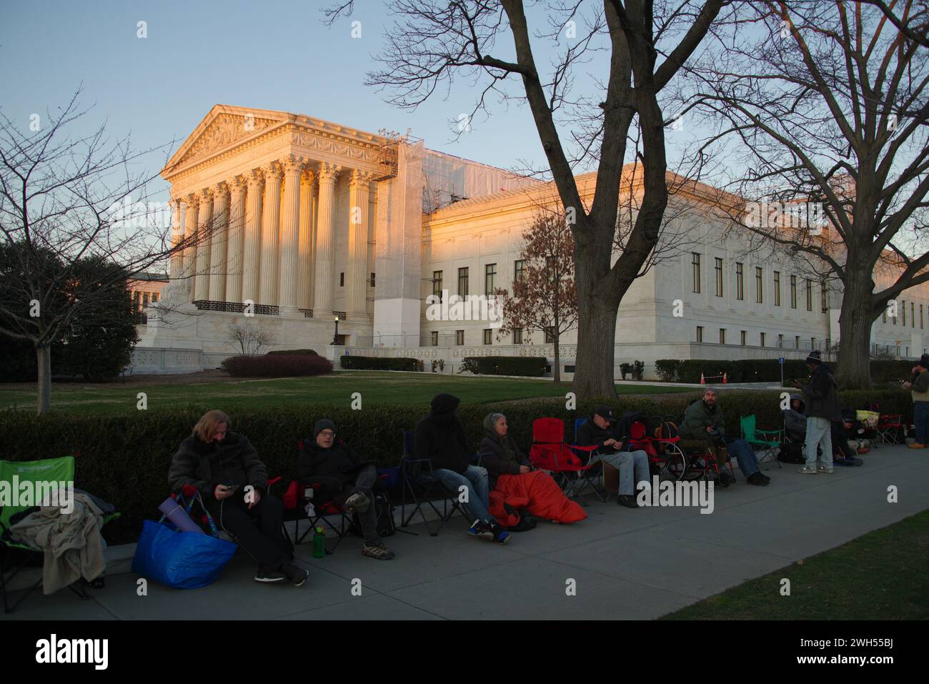 Washington, DC, USA. 7 Feb 2024. People line up outside the Supreme Court for a seat in the courtroom to watch the oral arguments for former president Donald Trump's Colorado 14th Amendment disqualification appeal. Credit: Philip Yabut/Alamy Live News Stock Photo