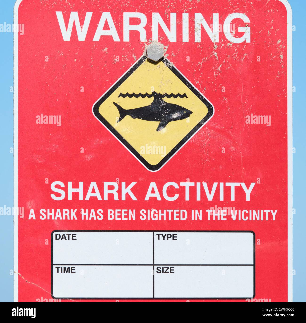 A warning sign for recording shark activity at the beach in Western Australia. Stock Photo