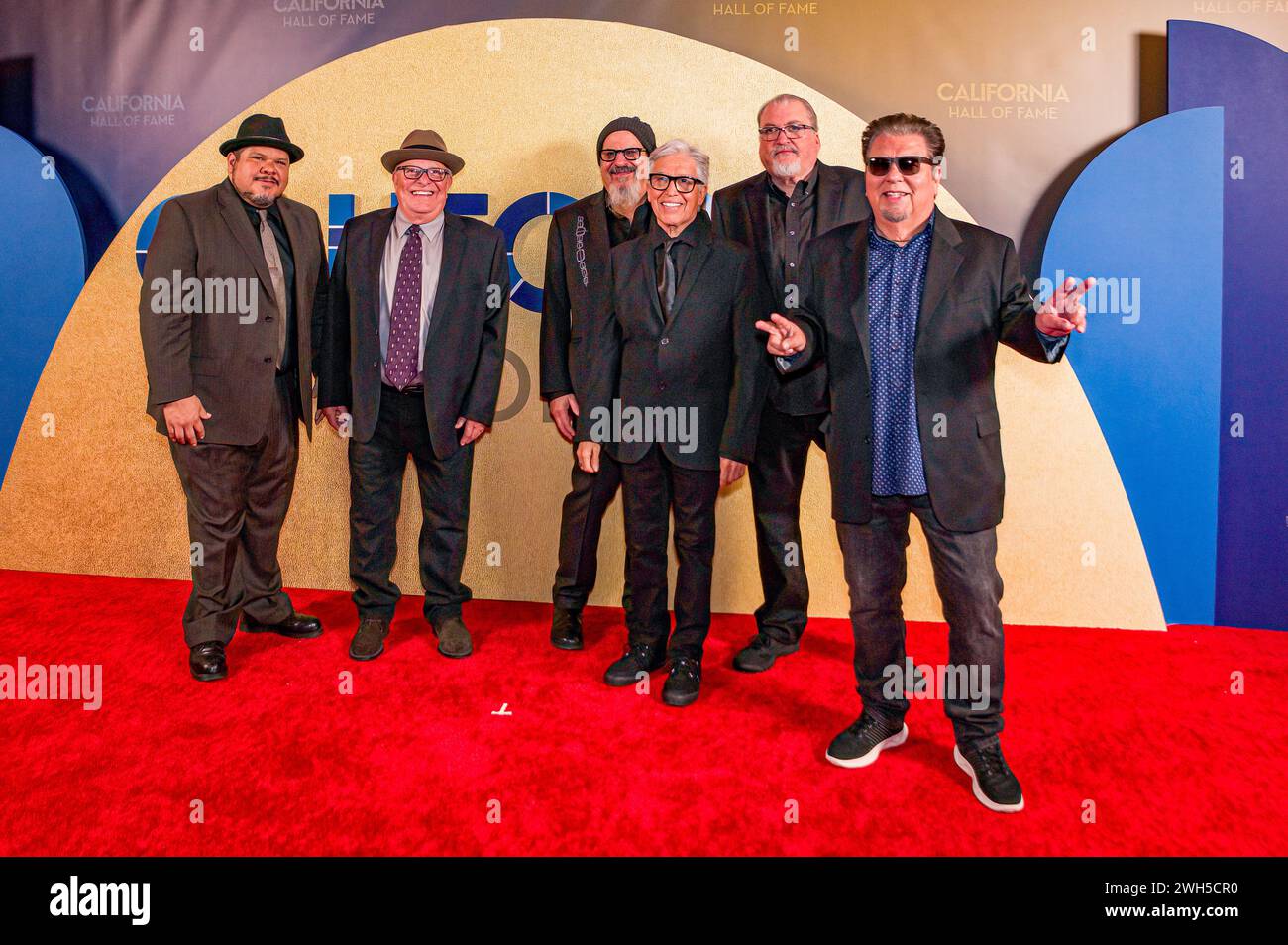 Iconic Chicano rock bank Los Lobos poses on the red carpet prior to their induction into the California Hall of Fame. Stock Photo