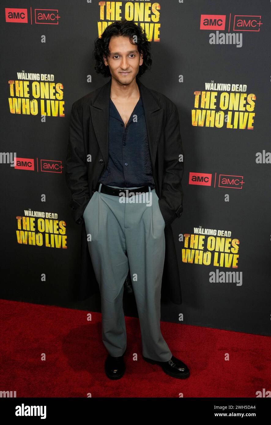 Assad Zaman poses at the premiere of the AMC series "The Walking Dead: The Ones Who Live