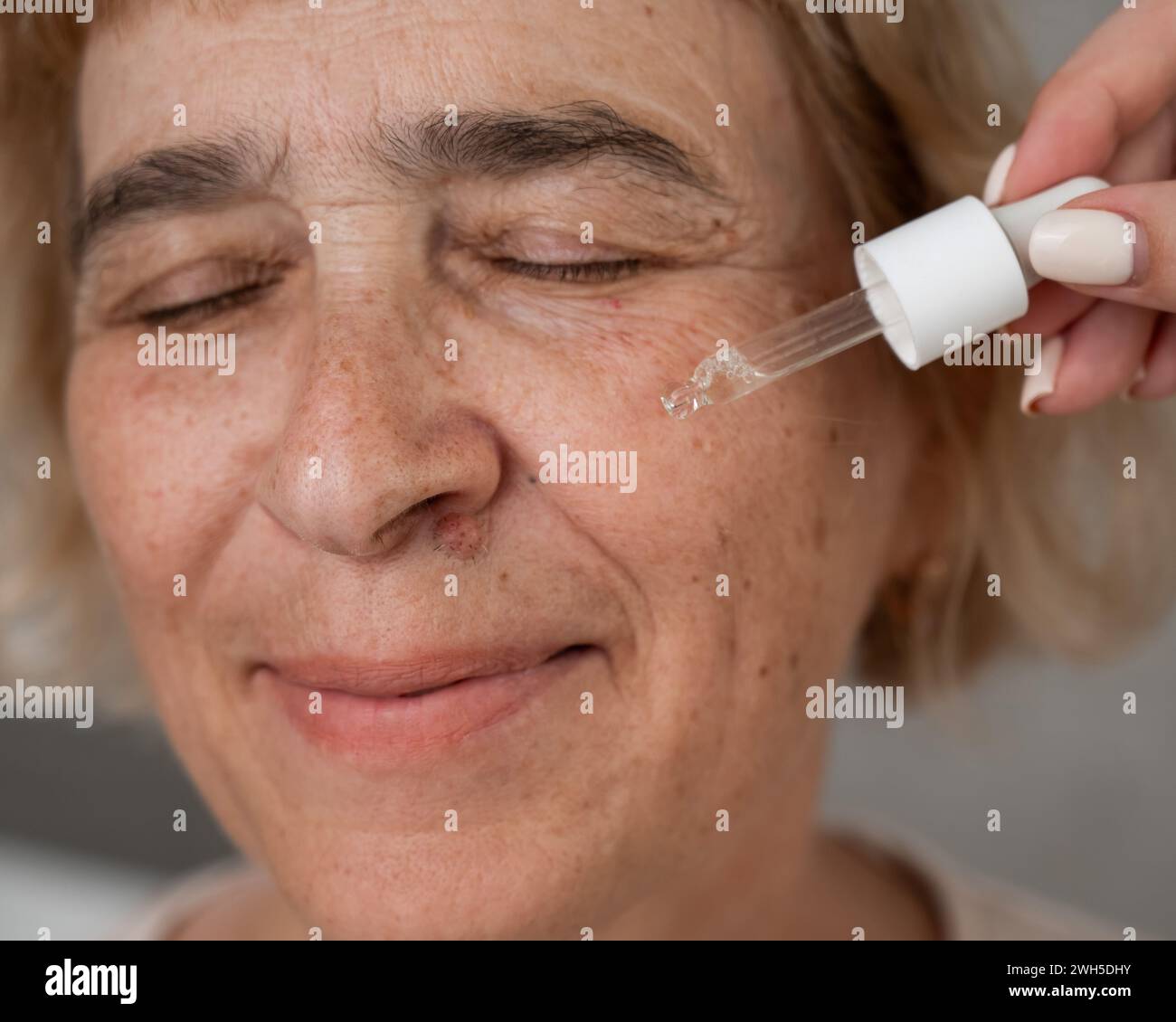 Woman face serum close up hi-res stock photography and images - Alamy
