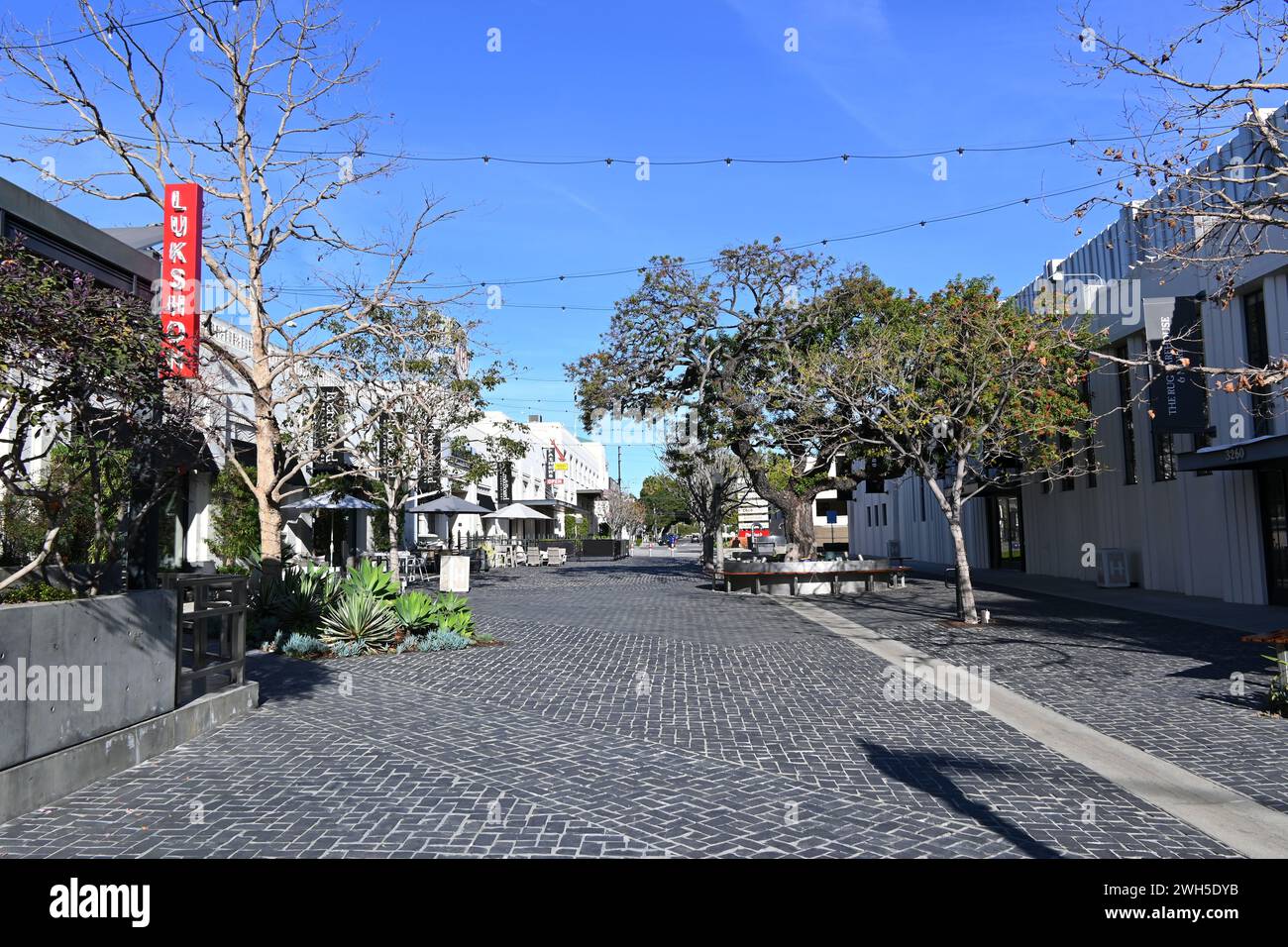 CULVER CITY, CALIFORNIA - 28 JAN 2024: Walkway between shops at the Helms Baking District. Stock Photo