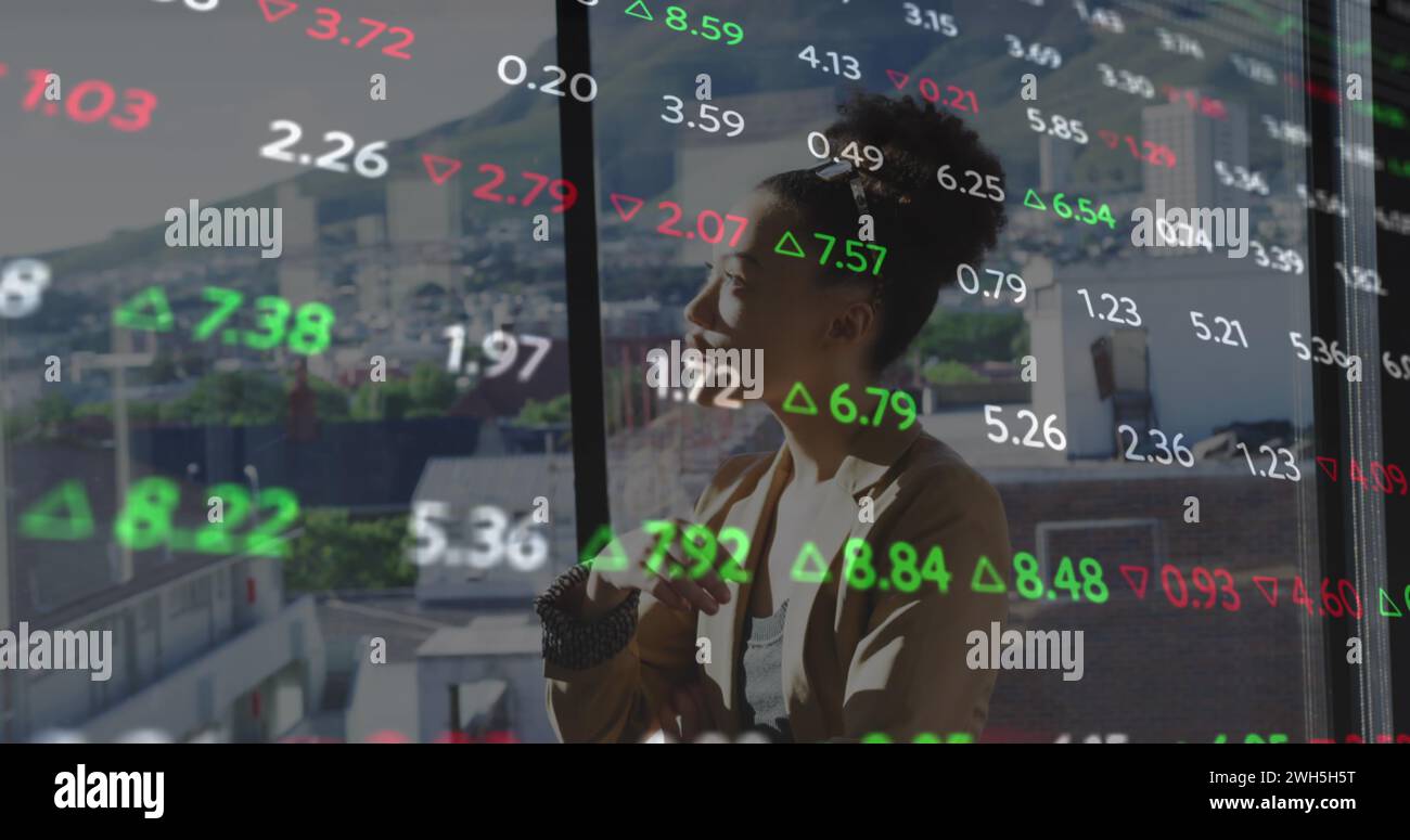 Image of data processing over african american businesswoman Stock Photo