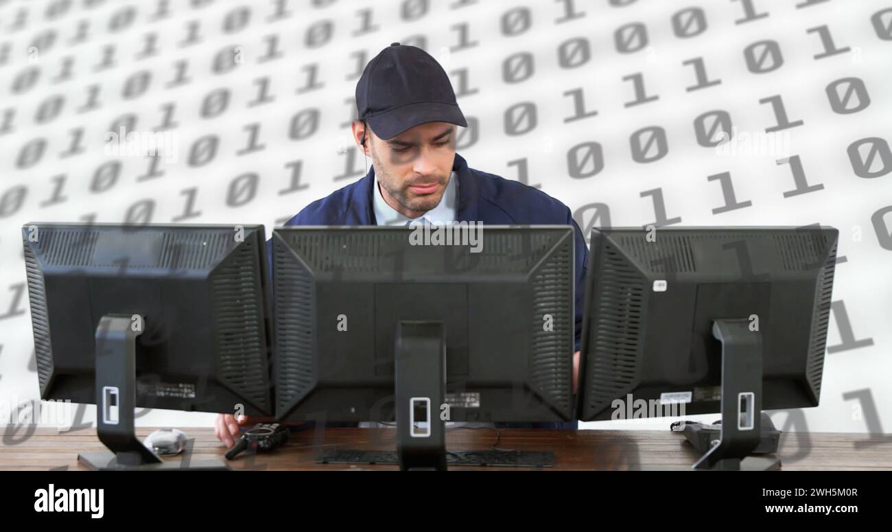 Image of scientific data processing over caucasian man using computer on white background Stock Photo
