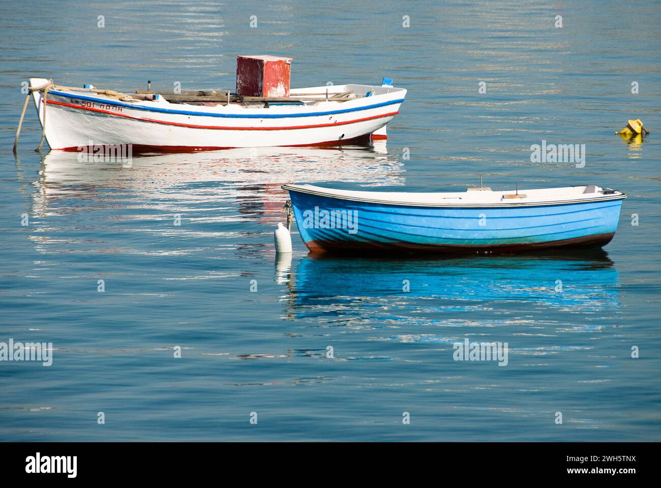 The Fishing boats on the Greek Cyclades island of Milos. Stock Photo