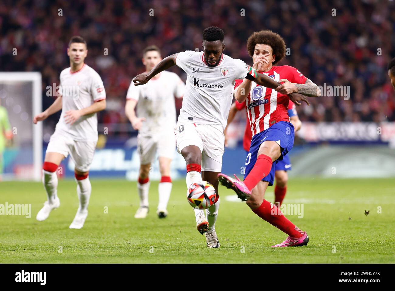 Inaki Williams of Athletic Club and Axel Witsel of Atletico de Madrid during the Spanish Cup, Copa del Rey, Semi-final 1st leg football match between Atletico de Madrid and Athletic Club de Bilbao on February 7, 2024 at Civitas Metropolitano stadium in Madrid, Spain Stock Photo