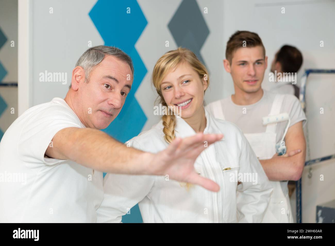 portrait of painter with apprentices Stock Photo