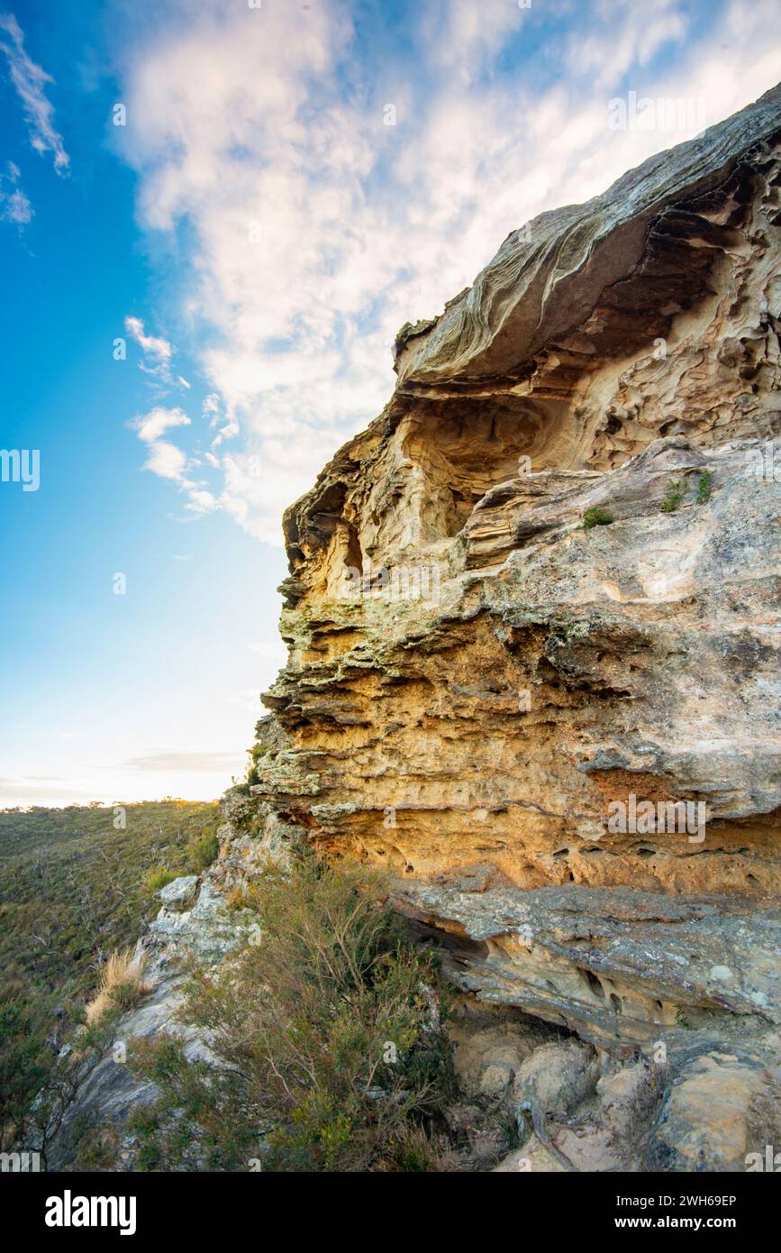 A wind and rain eroded sandstone cliff edge at Lincoln's Rock, Wentworth Falls, New South Wales, Australia Stock Photo