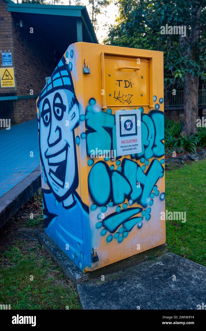 A free and anonymous needles, syringes and sharps goods collection bin in the New South Wales town of Lawson in Australia Stock Photo