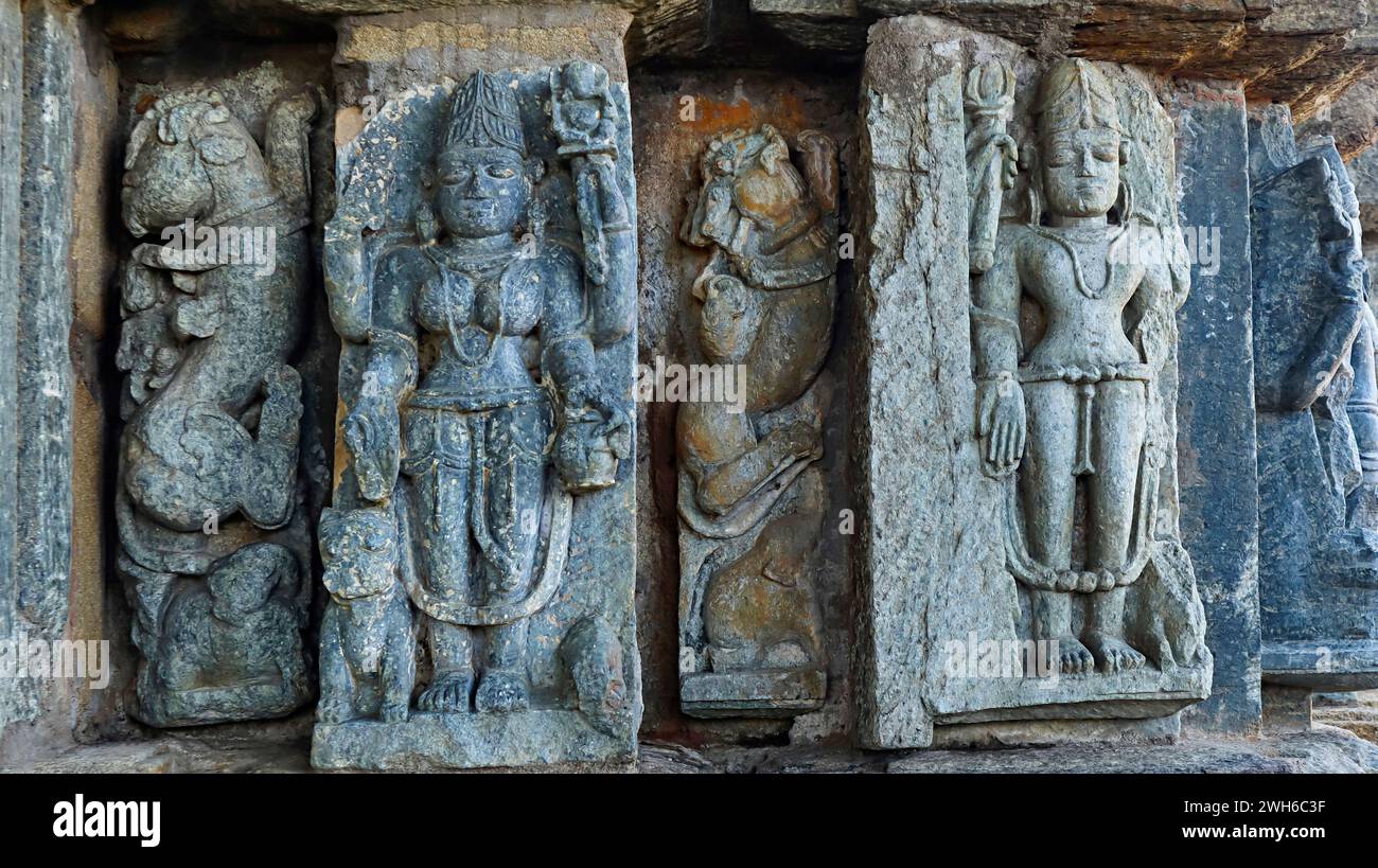 Carvings of Goddess Parvati, Lord Shiva and Yali on the Chandraditya Temple, Barsur, Bastar, Chhattisgarh, India. Stock Photo