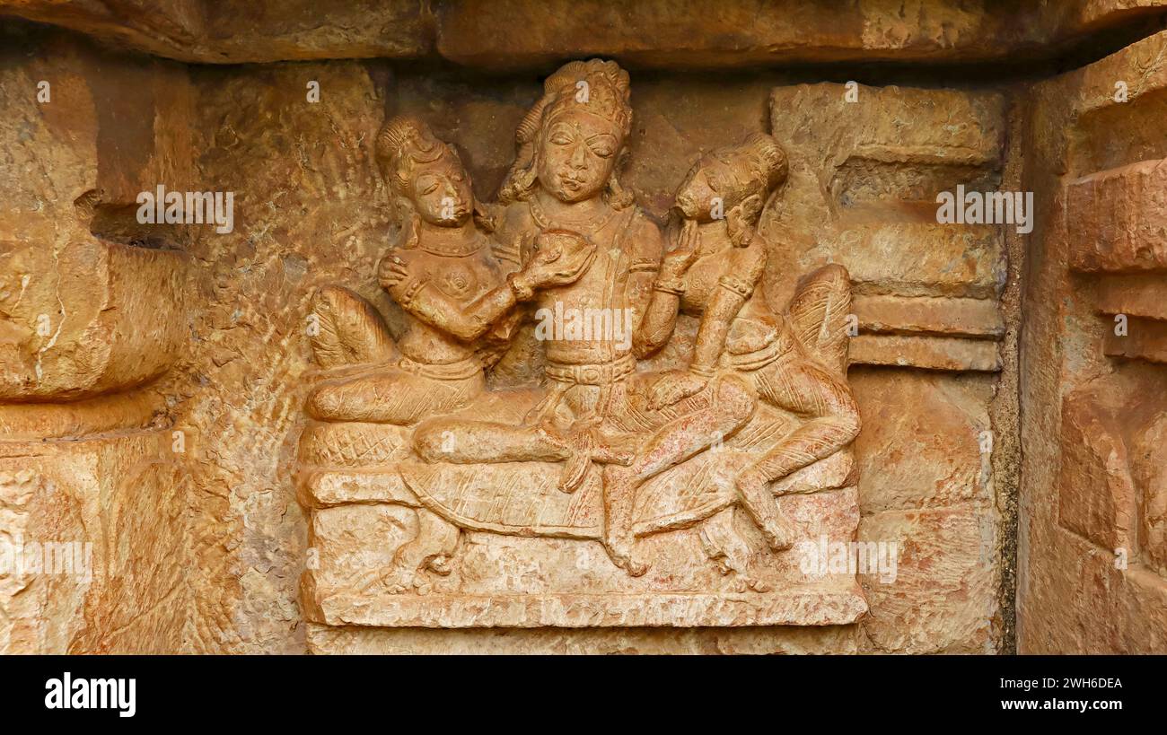 Ancient Sculpture of God With Maids on the Bhima Kichak Temple, Malhar, Bilaspur, Chhattisgarh, India. Stock Photo