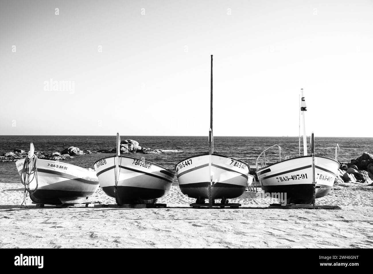 Coastal Charms: Fishing Boats of Calella de Palafrugell Stock Photo
