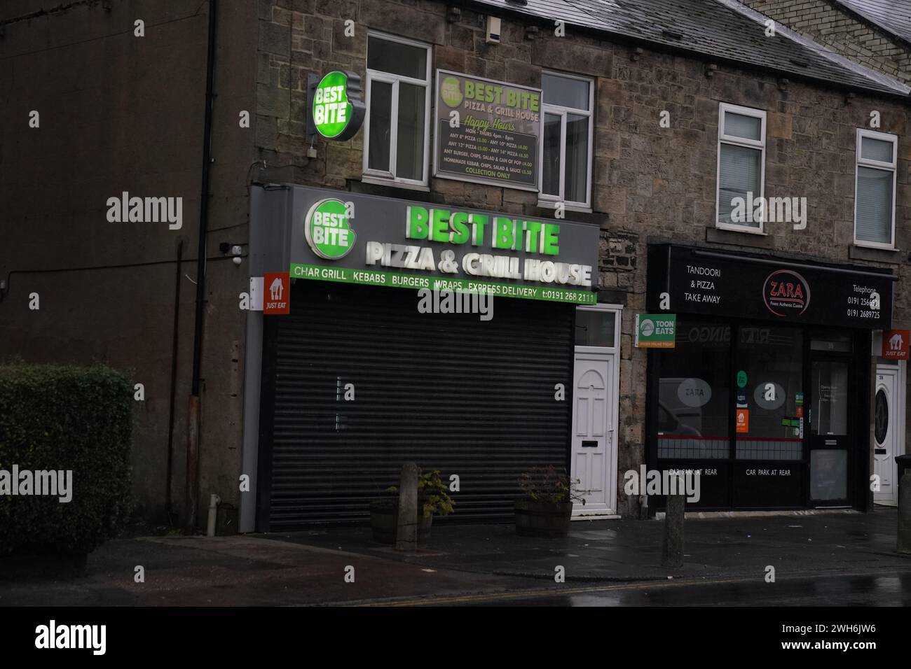 A view of the Best Bite pizza and grill house in the Forest Hall area of Newcastle upon Tyne, one of two addresses raided by armed police as part of their search for Clapham alkali attack suspect Abdul Ezedi. The Metropolitan Police said the warrants, including one at Ezedi's place of work, were carried out in the early hours of Thursday. Picture date: Thursday February 8, 2024. Stock Photo